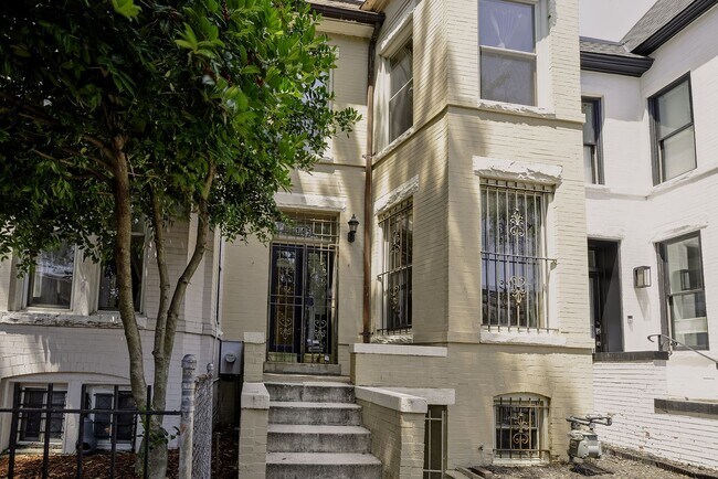 Building Photo - Historic & Charming 3BR Rowhouse near Howard is Move-in Ready!