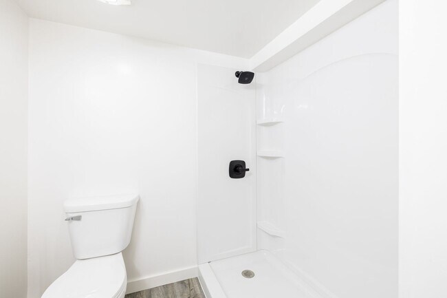 Building Photo - Charming home with a finished basement and...
