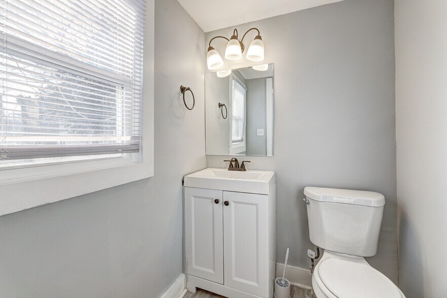 First floor half bathroom. - 60 S Carrollton Ave