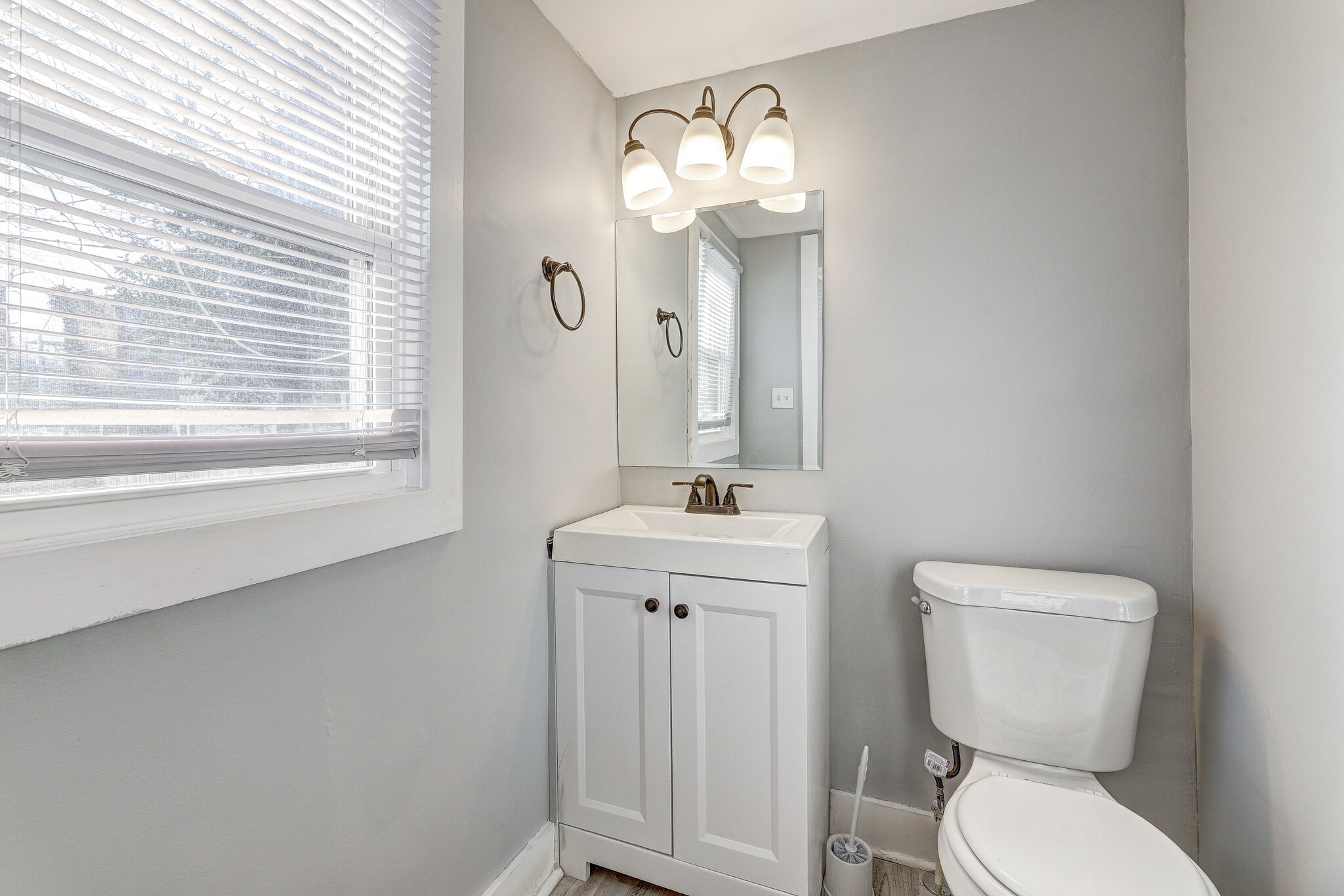 First floor half bathroom. - 60 S Carrollton Ave