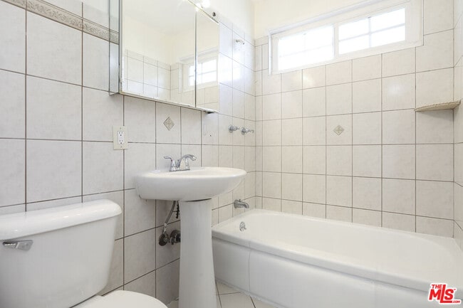 Building Photo - 8326 Barnsley Ave