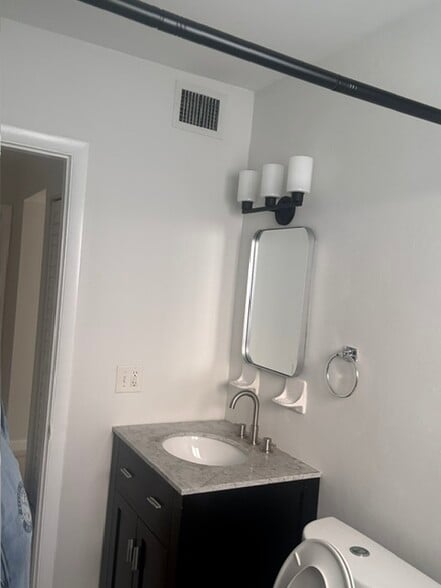 2nd renovated bathroom - 151 SE 6th Ave