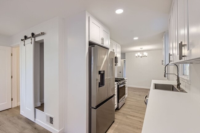Building Photo - Remodeled 2BD, 1.5BA Chaffee Park Home with 1-Car Garage