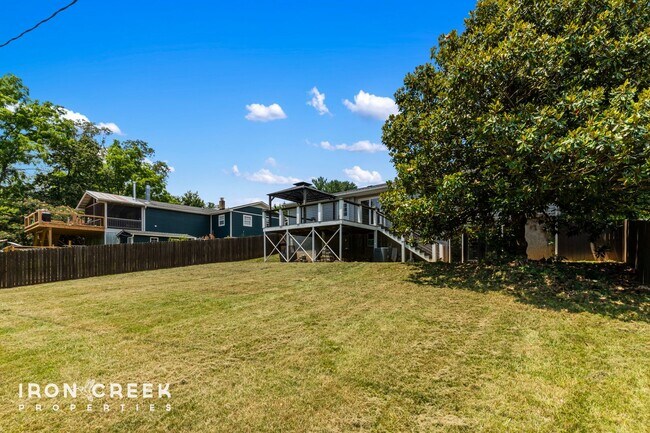 Building Photo - Beautifully Updated Three-Bedroom with Koi...