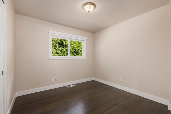Building Photo - Updated Split-Level Home with Flexible Living Spaces & Backyard Deck