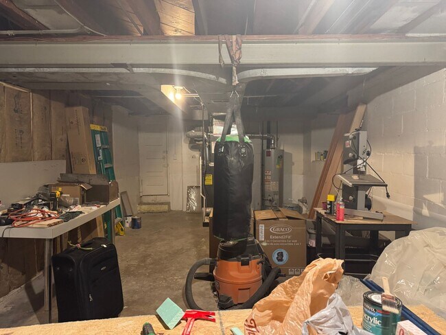 Building Photo - Charming Brick Ranch with Finished Basement & Fenced Yard