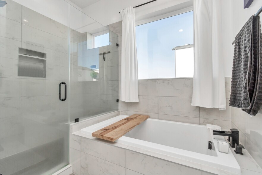 Primary Bedroom on 3rd Floor with two private closets and en-suite bathroom - 1815 Elite Dr