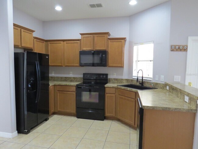 Building Photo - 4175 Shade Tree Ln