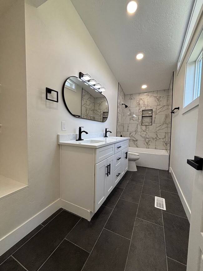 Building Photo - Beautifully Renovated 4-Bedroom Home with Finished Basement