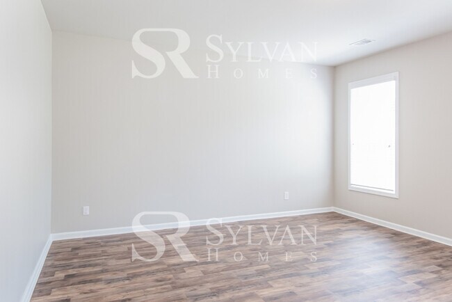 Building Photo - Embrace the charm of this 4 BR, 2.5 BA home