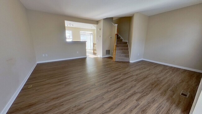 Building Photo - Spacious 3-Story Townhouse with One-Car Garage
