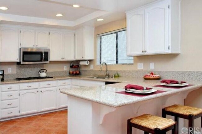 updated kitchen w/refrig - 5246 Calderon Rd