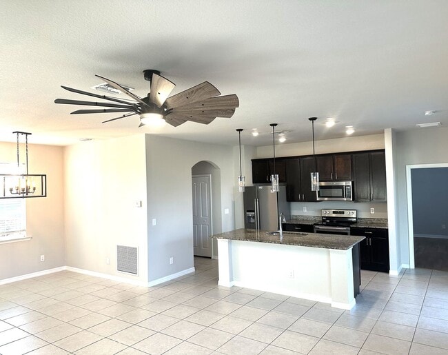Building Photo - Available Now!! NW CAPE CORAL 3 BEDROOM 2 BATHROOM 2 CAR GARGAGE