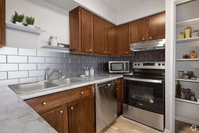 Fully Equipped Kitchen with Ample Pantry Space & Stainless Steel Appliances - Pinehill Park