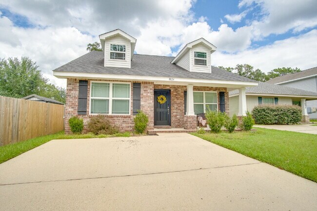 Building Photo - Spacious Cottage-Style Home Near UWF, Navy Federal & West Florida Hospital with Private Upstairs ...