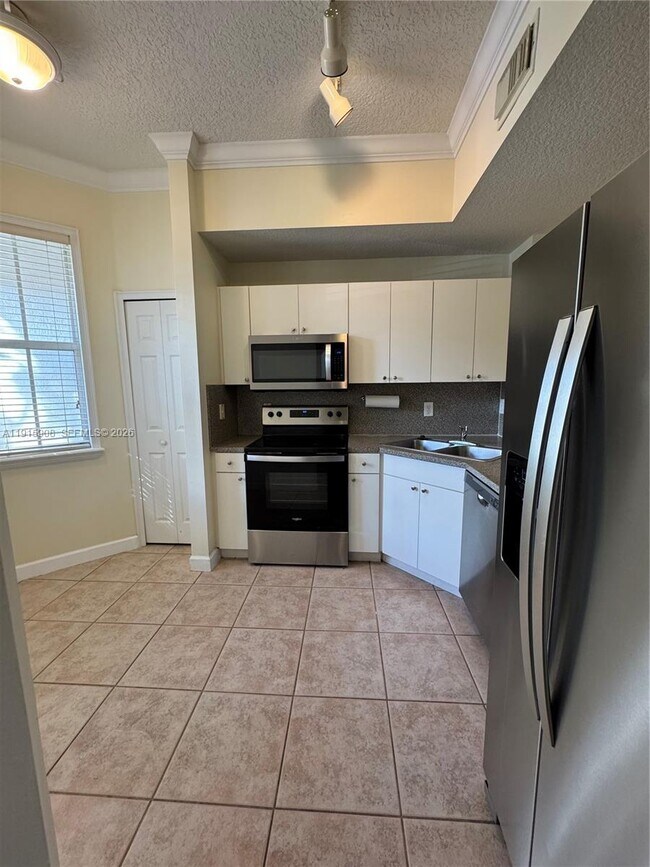 Building Photo - 10159 NW 43rd Ter