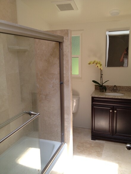 Bathroom, travertine shower - 3463 Mandeville Canyon Rd