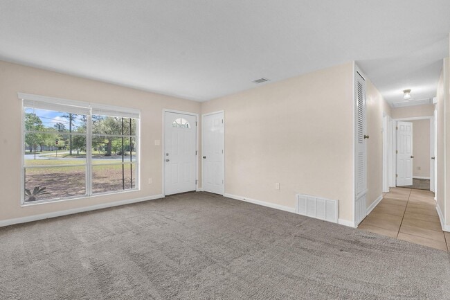 Building Photo - Updated Kitchen and Oversized Yard!