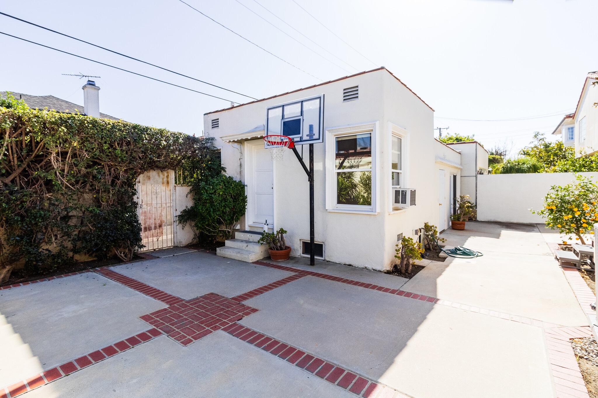 Separate Guest House Exterior - 240 S Palm Dr