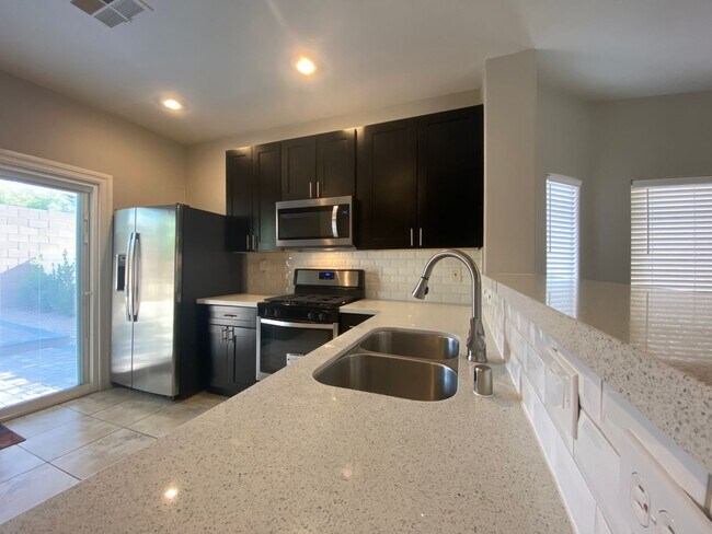 Building Photo - Beautiful 4-Bedroom Home with Den in Mountain’s Edge