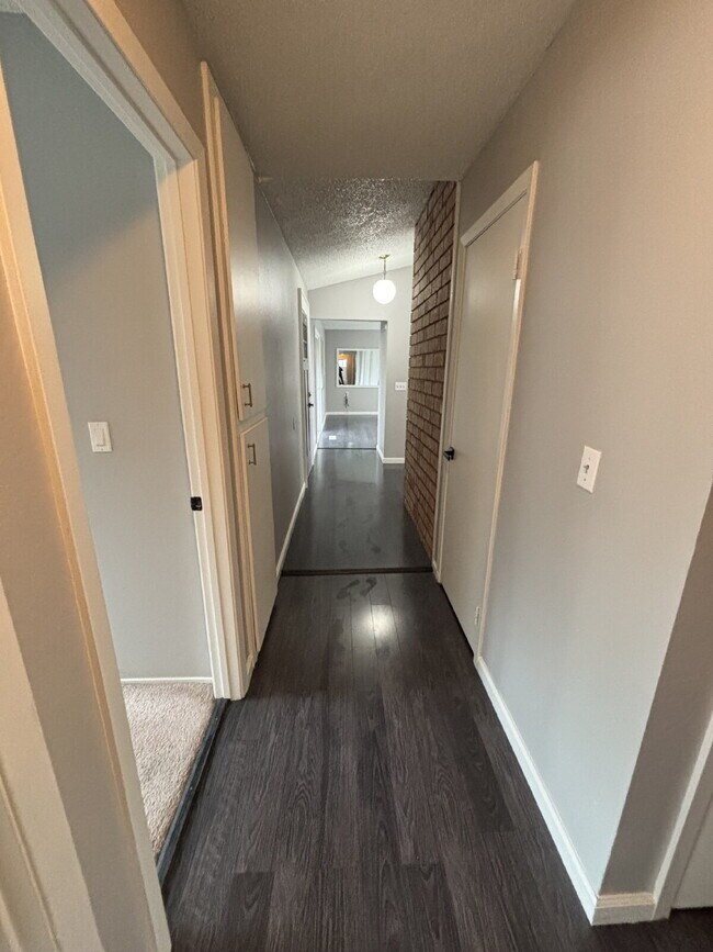 Building Photo - "Charming Concord Retreat: 3-Bedroom Gem with Granite Accents & Cozy Fireplace"