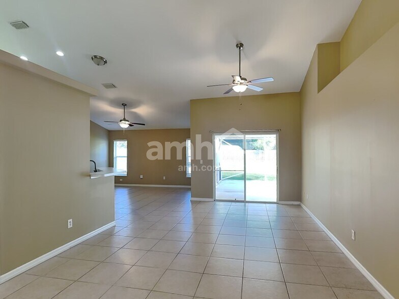 Building Photo - 5869 NW Leghorn Ave