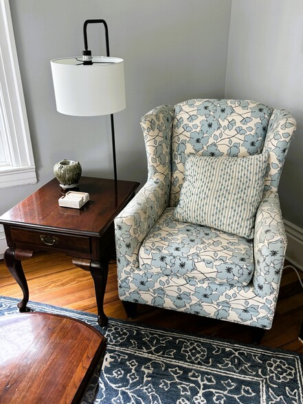 living room chair - 182 S French Broad Ave