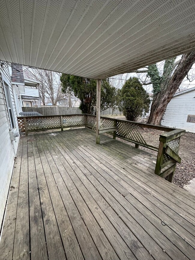 Building Photo - Introducing a charming Three Bedroom, One ...