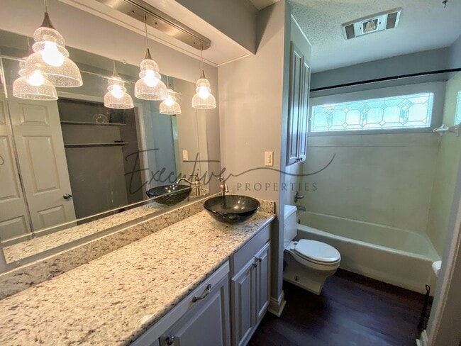 Building Photo - 2-Bed 2-Bath Home with Fenced Backyard – A...