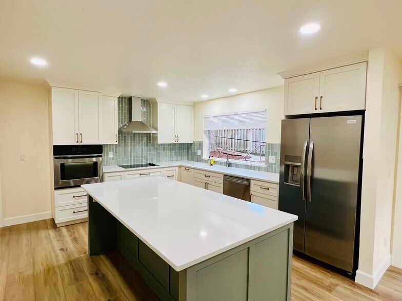 Kitchen from another rental, will have similar look/feel - 11965 NW Oatfield Ct