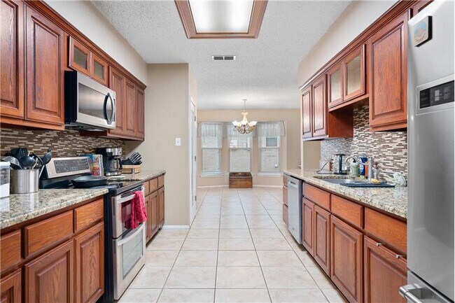 Building Photo - 13737 River Canyon Dr