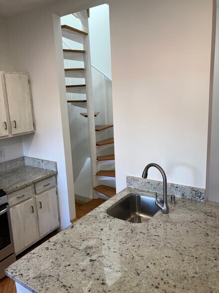 spiral stirs seen through passthrough from kitchen - 143 Sussex St