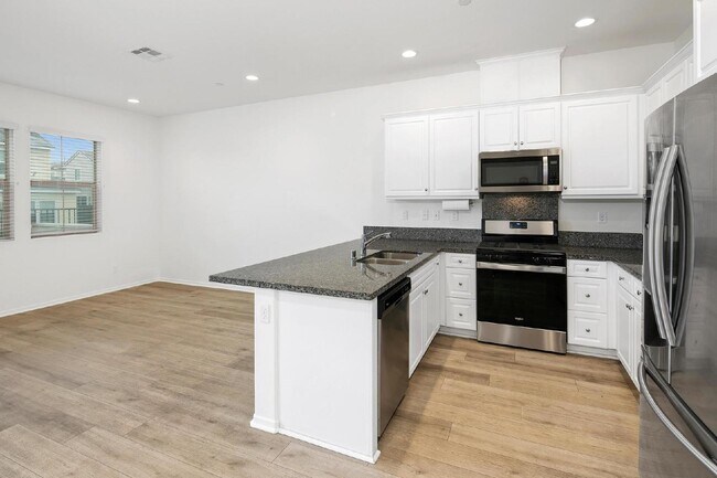 Building Photo - Village of Escaya - 3 Br 2.5 Ba - 2 car attached garage - must see this fabulous community!
