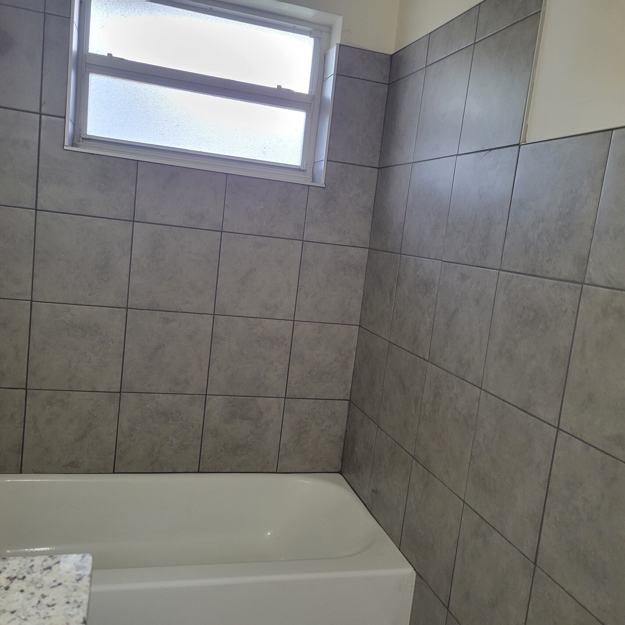 new tub and wall tiles - 2031 NE 56th St