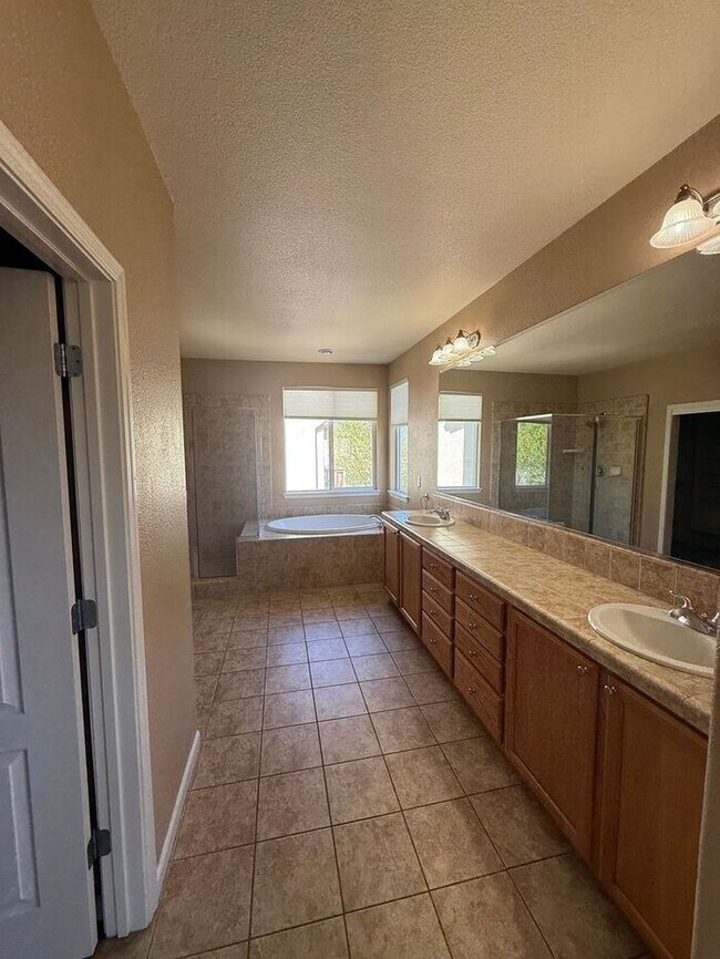 Building Photo - COMING SOON! Spacious 4 Bed 3 Bath Two-Story Home in Curti Ranch