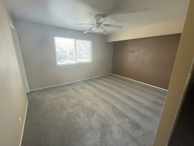 Building Photo - Spacious 6-Bed Oasis with Finished Basement & Cozy Fireplace.