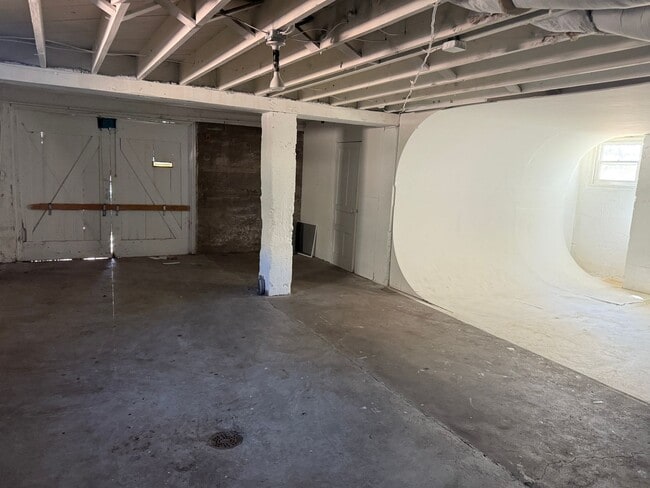 Building Photo - 4 Br, 2 Ba with kitchen appliances and basement for added storage.