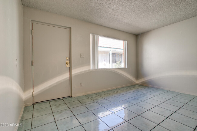 Building Photo - 7850 E Glenrosa Ave