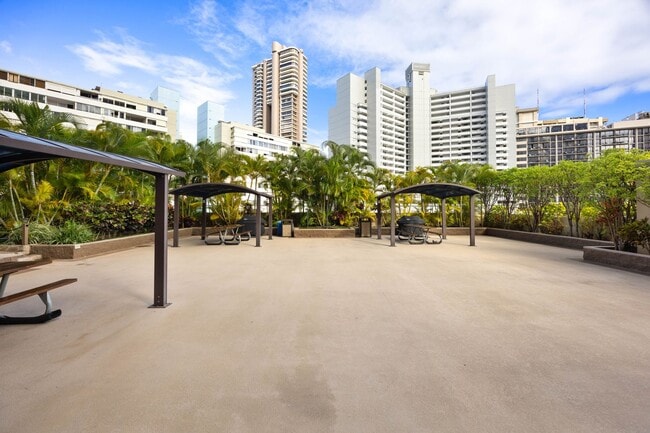 Building Photo - Luxury Waikiki Living with Panoramic Ocean & Sunset Views