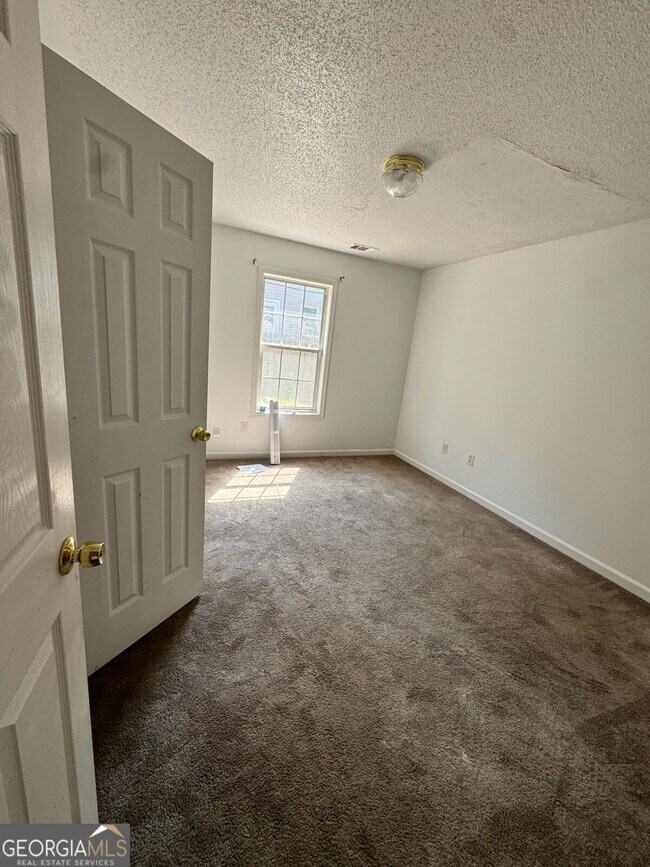 Building Photo - 6922 Red Bone Way