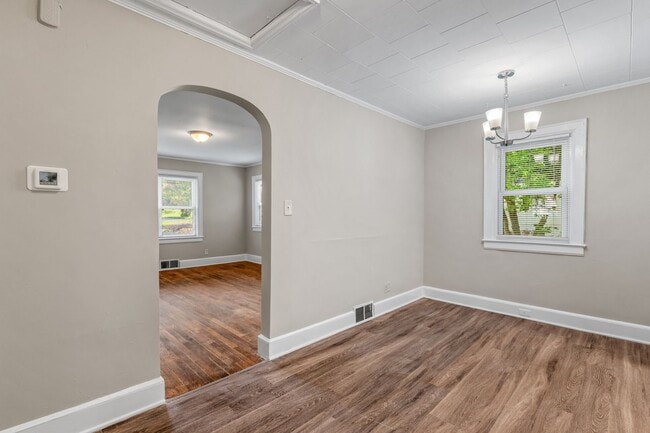 Building Photo - Adorable Home, Just Painted, Wood Flooring...