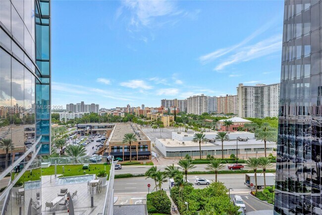 Building Photo - 17121 Collins Ave