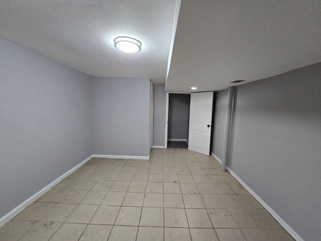 Building Photo - 3 bedroom with bonus extra room in basement fully rehabed