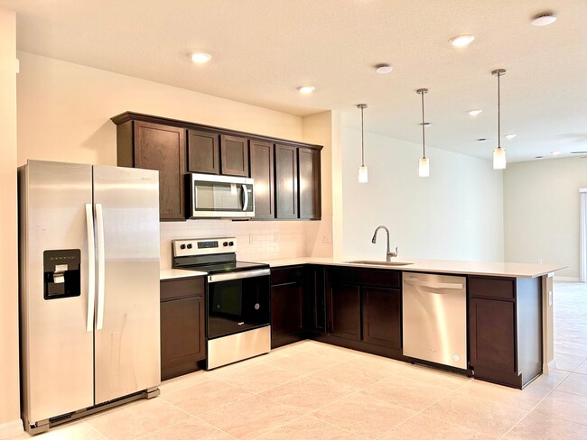 Building Photo - Live in style: Family-friendly 3BR, 2.5BA ...