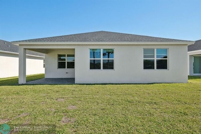 Building Photo - 9041 Dahlia Cir