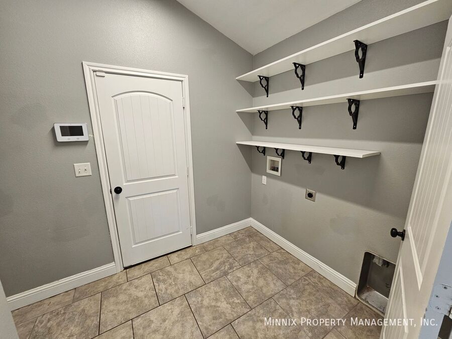 Building Photo - 6902 Ranch Hand Dr
