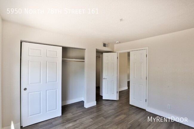 Building Photo - Stunning 3-Bedroom Condo -MOVE IN SPECIAL!...