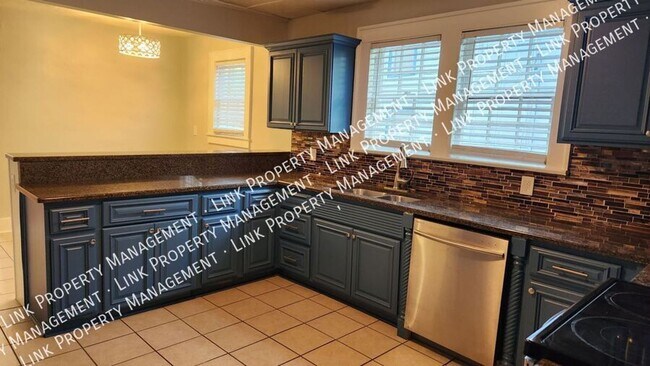 Building Photo - Charming Fully Renovated 4-Bedroom Home in...