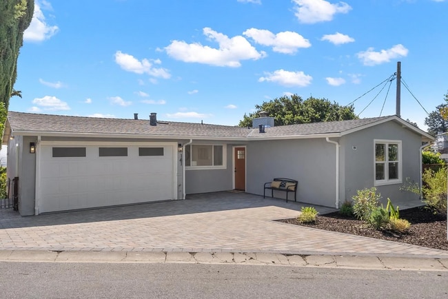 Building Photo - "Remodeled - Charming 3-Bed Sanctuary with...