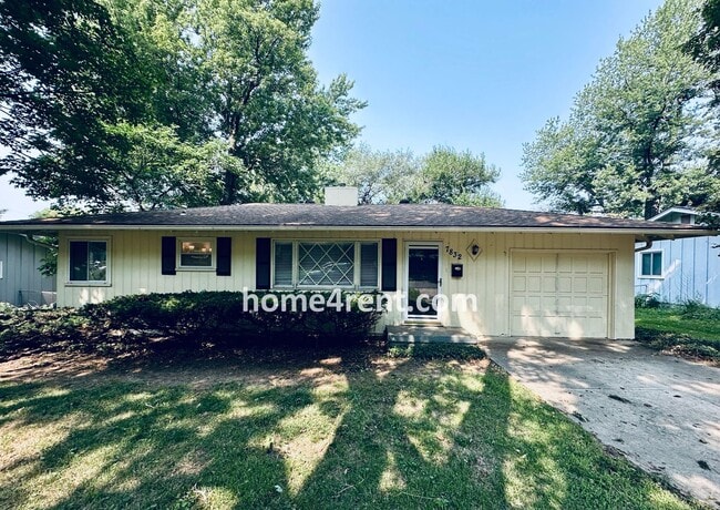 Building Photo - Attractive Prairie Village Ranch w/ FRESH PAINT, Wood Floors, Granite Counters and a Fenced Yard!